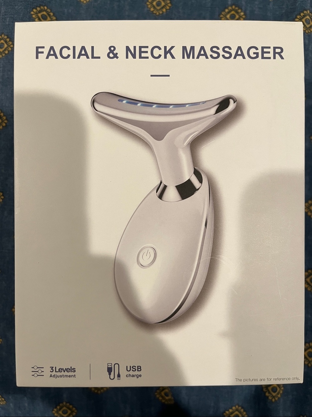New in Box, Advanced Facial & Neck Massager; 3 Levels, 7 color,LED lights, sleek